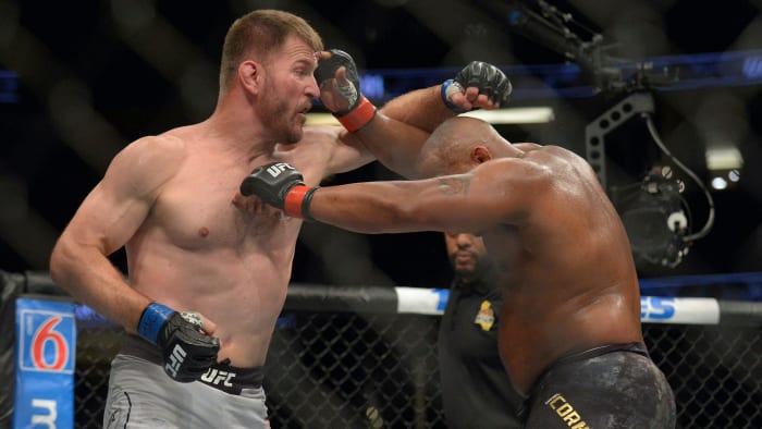 Daniel Cormier lands a hit against Stipe Miocic during UFC 241 at Honda Center.